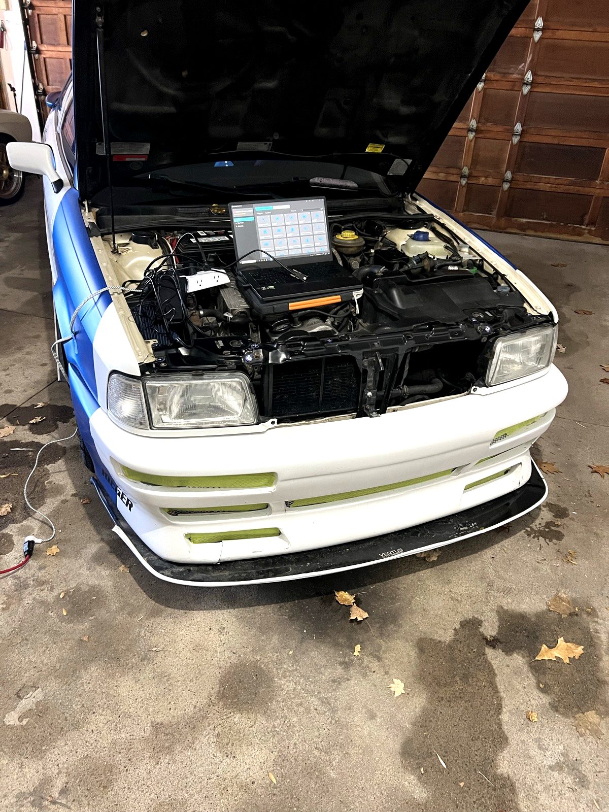 The Audi 90 in the shop before scanning — a rare front end you can't simply reorder.