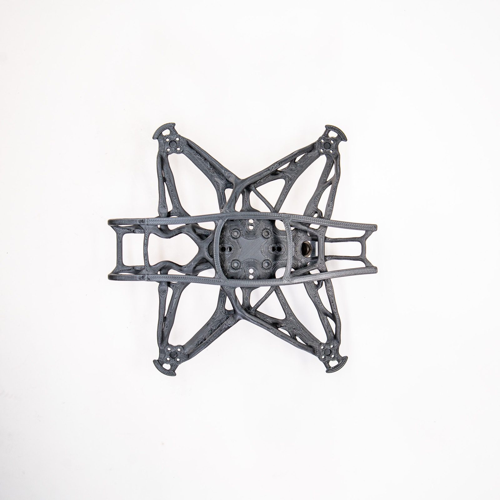 Top-down view of the lattice frame — material only where the loads are, and nothing where they aren't.