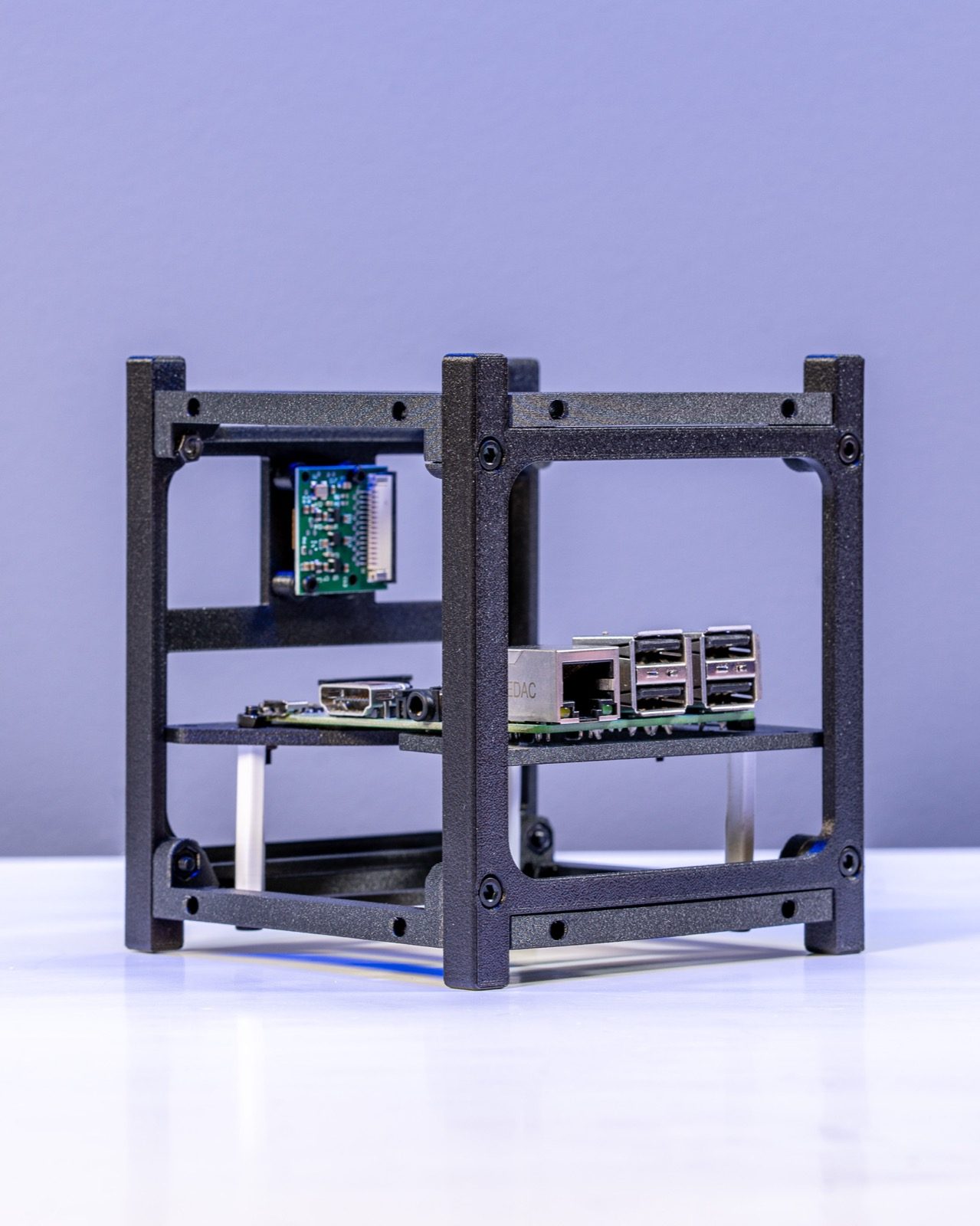 The Raspberry Pi and ports seated in the printed frame, with room left for added HATs, sensors and modules.